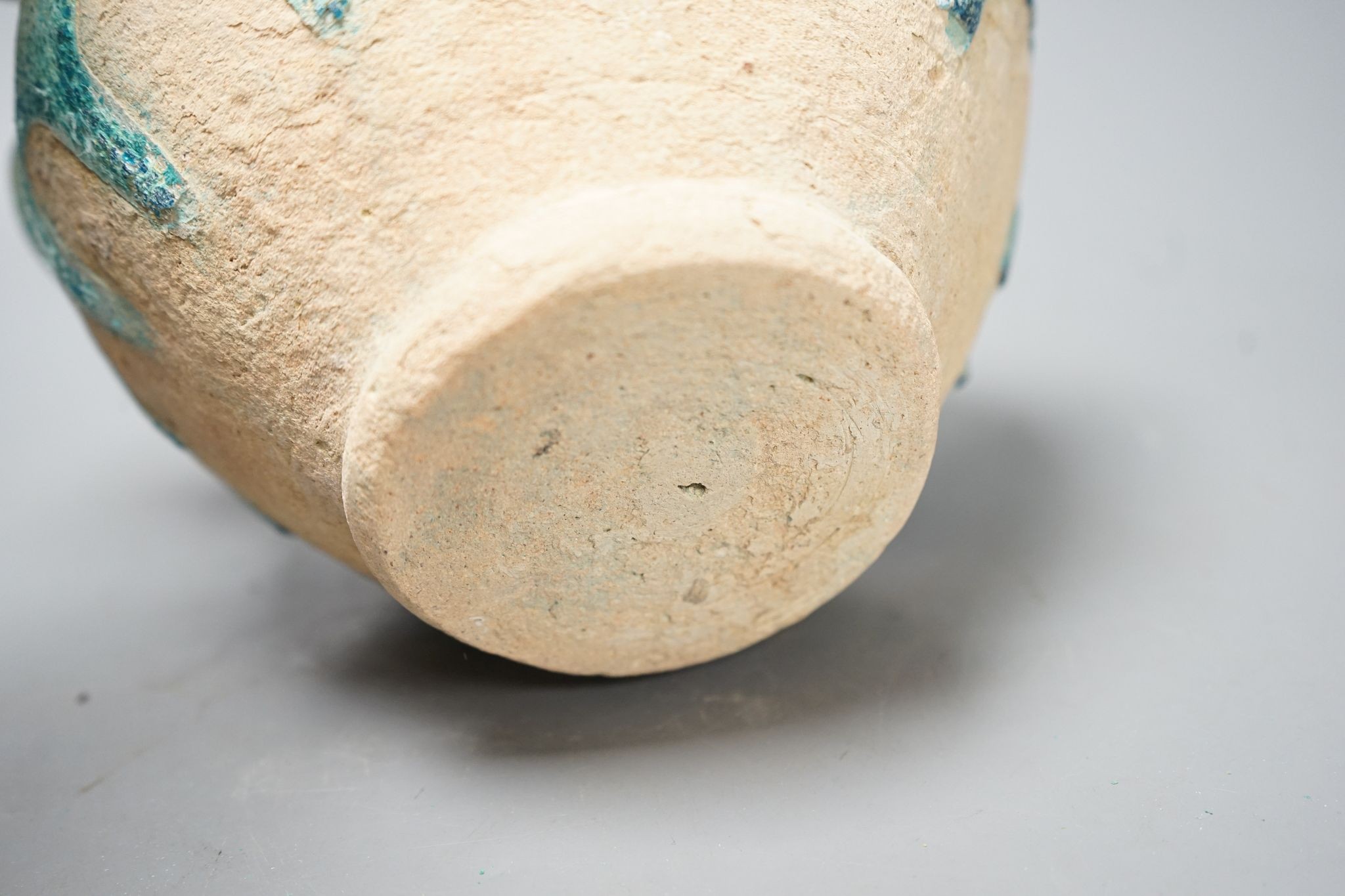 A Kashan turquoise glazed azed jar, 13th/14th century, 22cm